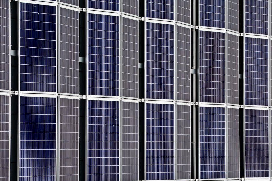 Close-up of multiple solar panels representing renewable energy and sustainability.